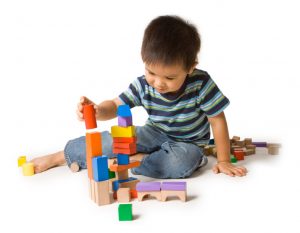 boy builds tower